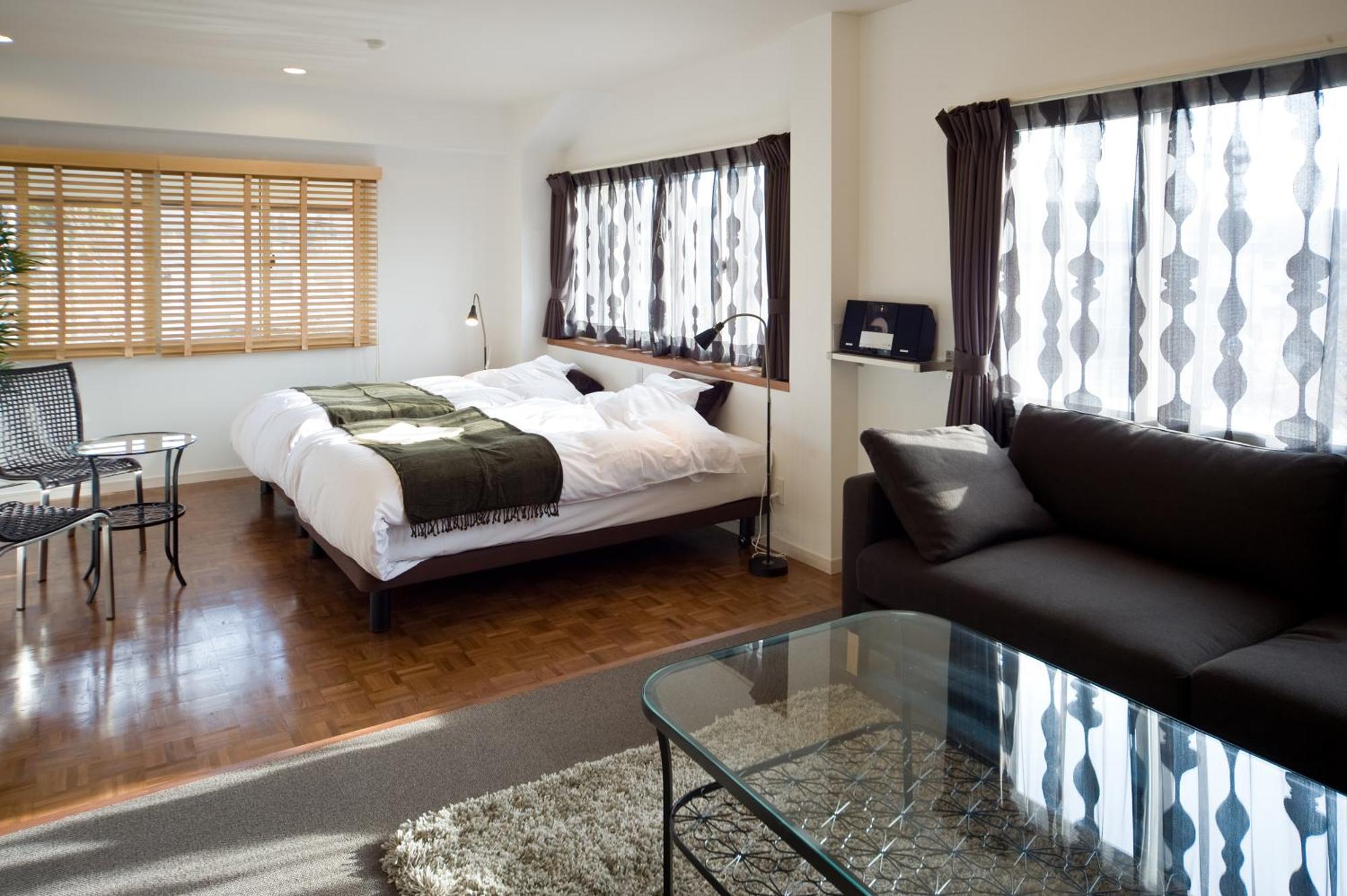 ฮอลิเดย์เฮาส์กรีนการ์เด้น Hotel กุโจ ห้อง รูปภาพ